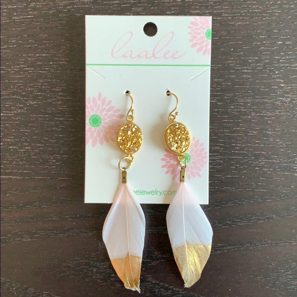 Laalee gold dipped feather earrings